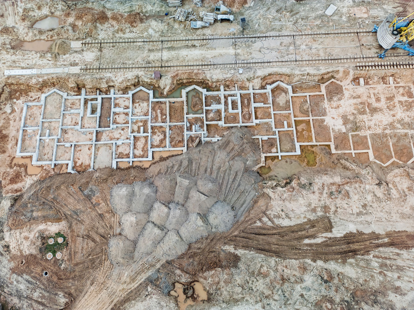 Aerial view of foundation layed for rowhouses.