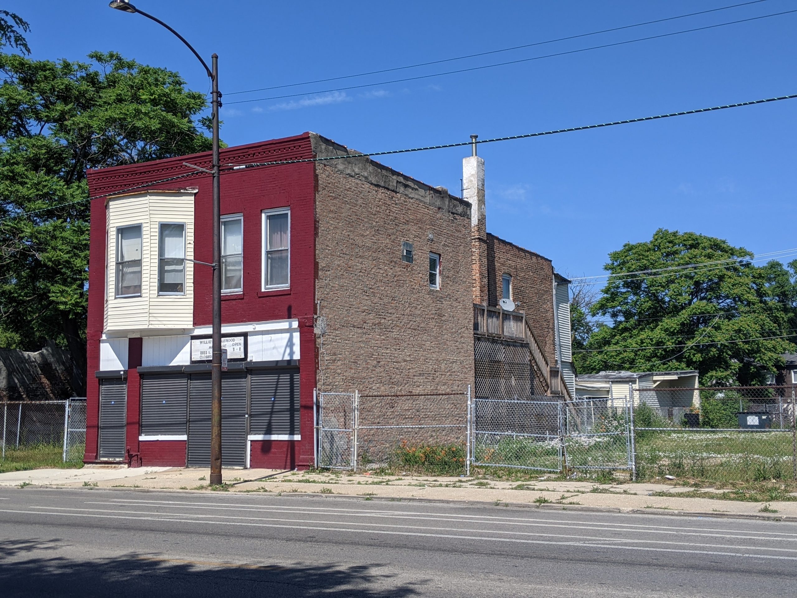 Image of the building with the adjacent lot